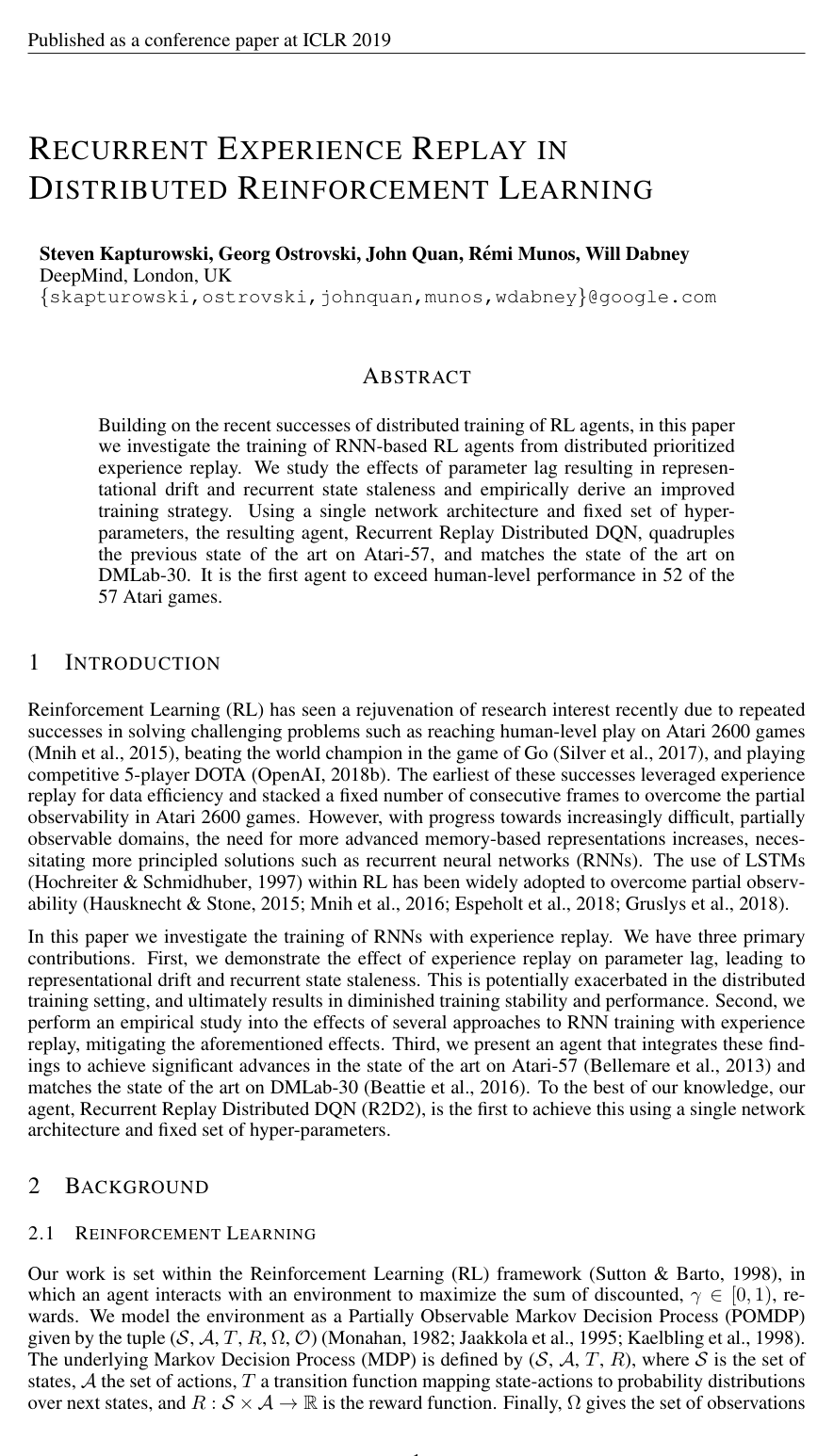 Recurrent Experience Replay in Distributed Reinforcement Learning